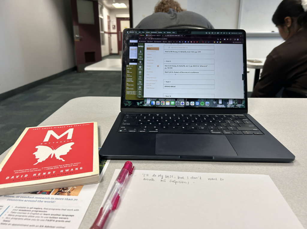 laptop, notebook, course materials in English Classroom